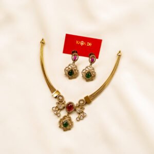 Gold choker with ruby and emerald stones and intricate detailing – Karra De.