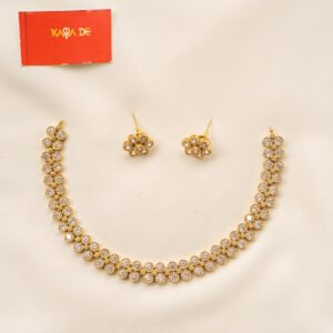 Gold diamond-cut neckpiece with sparkling clusters and matching stud earrings – Karra De.