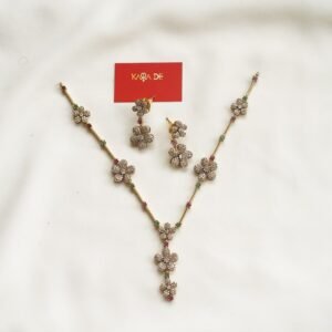 Gold floral diamond necklace set with multicolor stones by Karra De