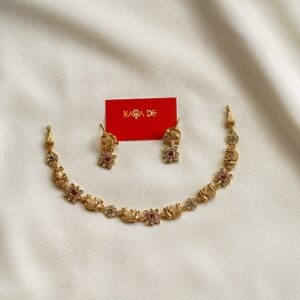 Antique gold temple neckpiece with elephant motifs and ruby-emerald stones – Karra De